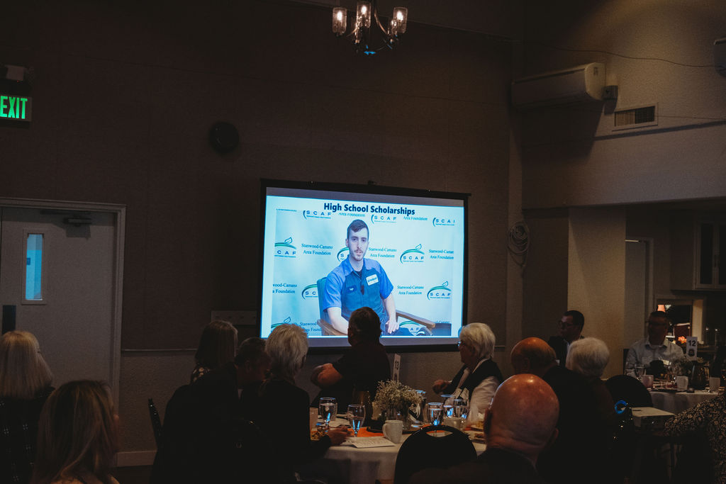 Gage Hutsell in on a video screen